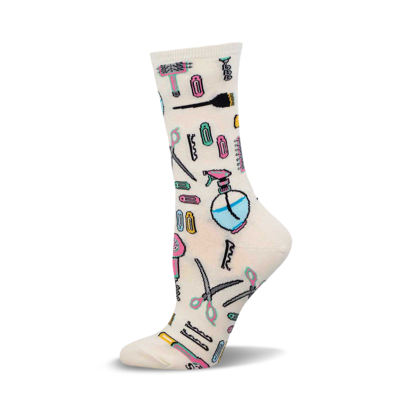 Cream crew socks adorned with a playful pattern of pastel-colored hair styling tools like scissors, combs, hair dryers, and hair clips.