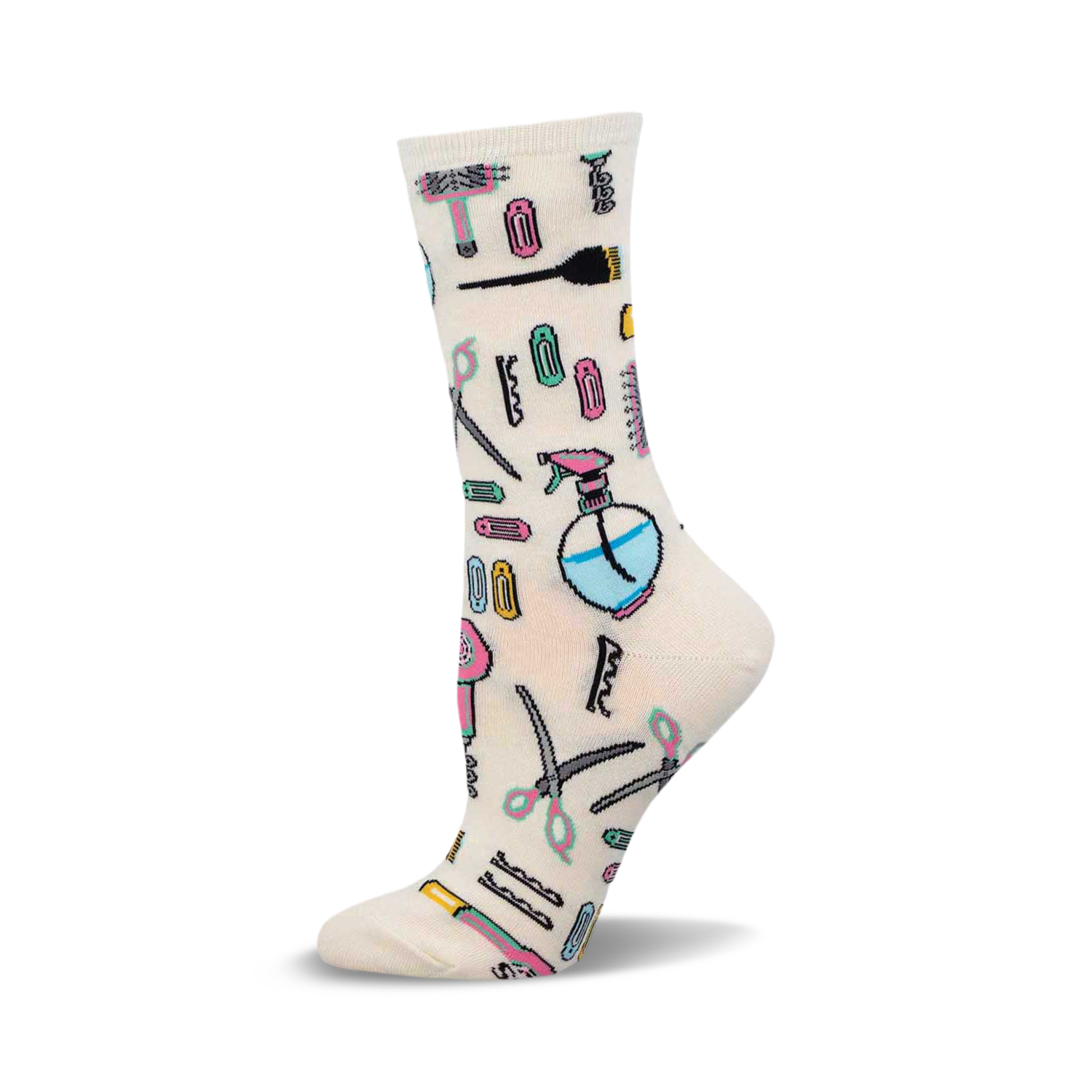 Cream crew socks adorned with a playful pattern of pastel-colored hair styling tools like scissors, combs, hair dryers, and hair clips.