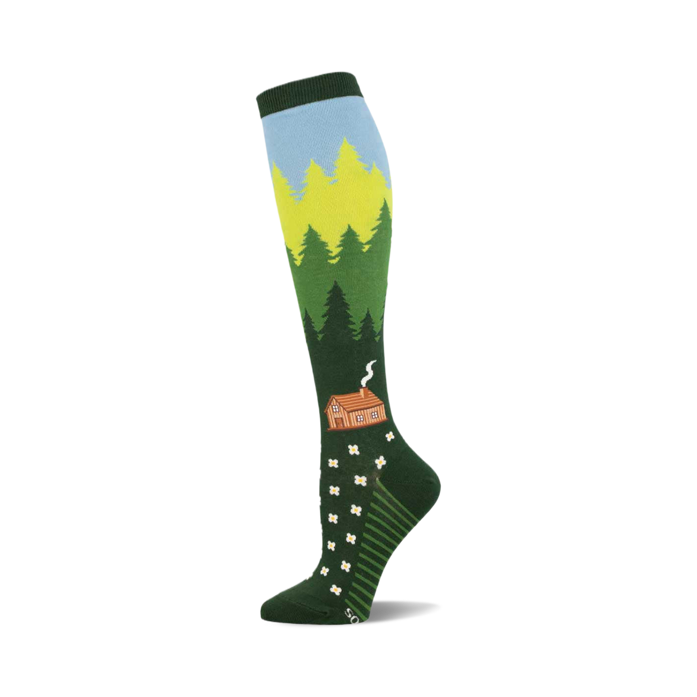 Knee-high socks in green, blue, and yellow depicting a forest scene with a cabin and white flowers. 