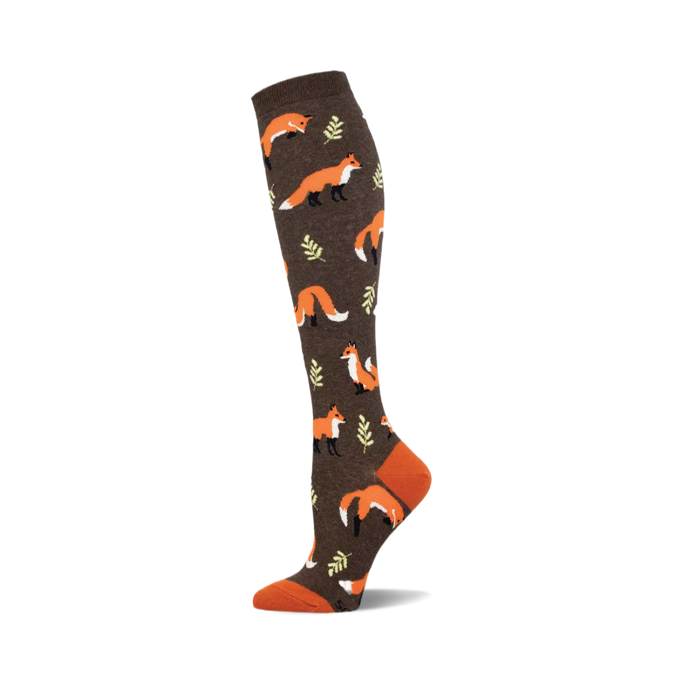 A brown knee-high sock with a repeating pattern of orange foxes and small green leaves. The toe and cuff are a contrasting burnt orange.