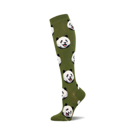 a green sock with a panda bear pattern.  the panda bears are white and black and have smiling faces.  the sock is a knee-high sock.