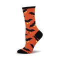 Orange crew socks with black bats and candy corn.  A fun, Halloween-themed design.