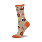 Crew socks in taupe with orange accents.  The design includes multiple illustrations of turkeys, pumpkins, and leaves.