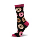 A black crew sock with pink and brown donut designs. The sock has a fuchsia cuff and is made of bamboo.