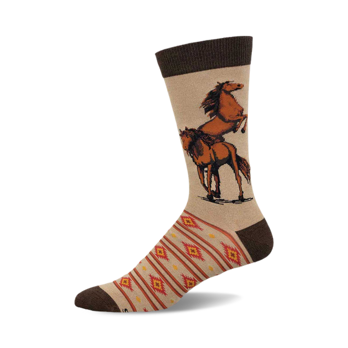 a tan sock with a brown top. the sock has a design of two brown horses on the front. one horse is standing on its hind legs and the other is standing on all fours. the sock also has a brown and orange geometric pattern on the bottom. }}