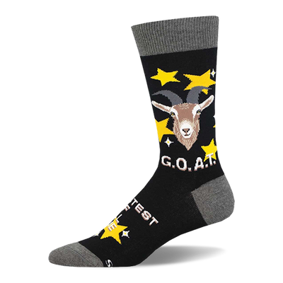 Black crew socks with grey cuffs, heels, and toes, featuring a brown goat head, yellow stars, and "G.O.A.T." text.