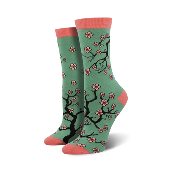 light green bamboo cherry blossom crew socks. features pink toes, heels, and cuffs. cute botanical cherry blossom design with pink and white blossoms. for women.  