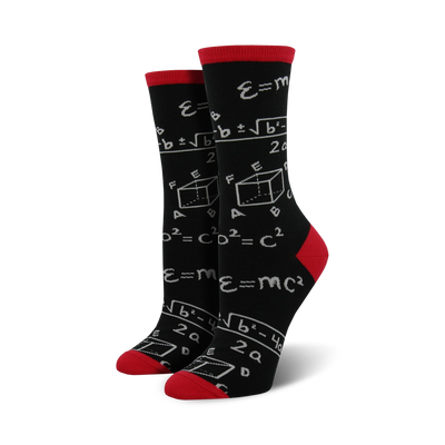 black math socks with red toes, heels, and soles, and gray and white equations and formulas all over. women's crew length.  