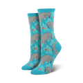 Pair of teal crew socks featuring a repeating pattern of gray manatees, orange fish, and white coral.