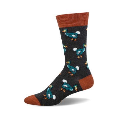 side view of yolo dodo socks; dark gray socks with teal dodos.  "you only live once" theme.