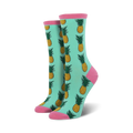 Pair of women's crew socks in teal with a repeating pineapple pattern.  Pink accents at the top and bottom.