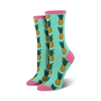 Pair of women's crew socks in teal with a repeating pineapple pattern.  Pink accents at the top and bottom.