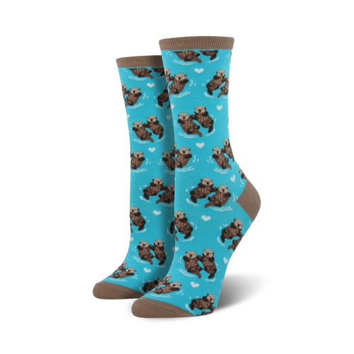 Pair of crew socks with a teal background featuring a repeating pattern of otters holding hands and small hearts.