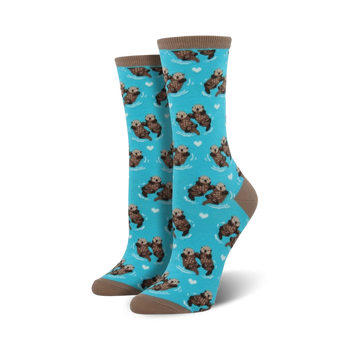 blue crew socks for women featuring a pattern of cartoon otters holding hands and scattered pink hearts   