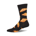 Black crew socks with a repeating pattern of golden brown croissants. These fun socks are perfect for adding a touch of personality to any outfit.