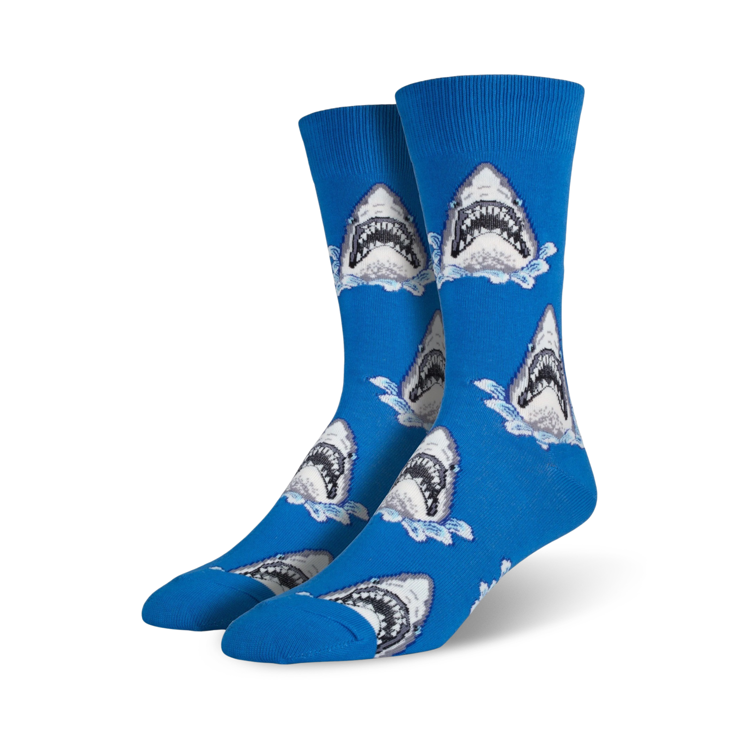 A pair of men's blue crew socks with a repeating pattern of great white shark jaws breaking the water's surface. 