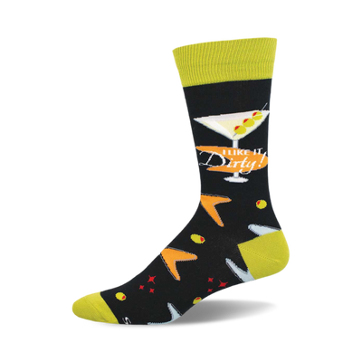 side view of "i like it dirty" socks featuring a martini glass, olives, and the phrase "i like it dirty!"  the socks are black with lime green cuffs and orange accents.