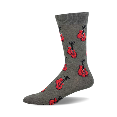 side view of "heavy hitter" gray crew socks featuring a pattern of red boxing gloves.