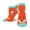 Pair of orange ankle socks with a cute fox face design. The socks have a teal/aqua-colored cuff.