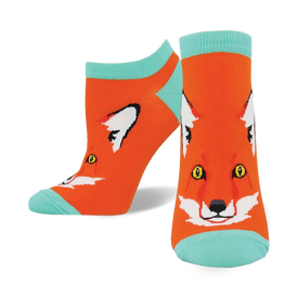ankle-length women's socks in orange with cartoon fox face design and mint green accents.  