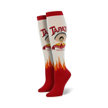 Pair of cream and red knee-high socks.  Features a Tapatio hot sauce bottle design, including the brand logo, mascot, and flames.