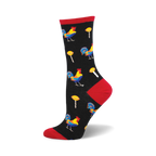 Crew socks in black with colorful rooster and lollipop designs. Red accents at the heel and toe.