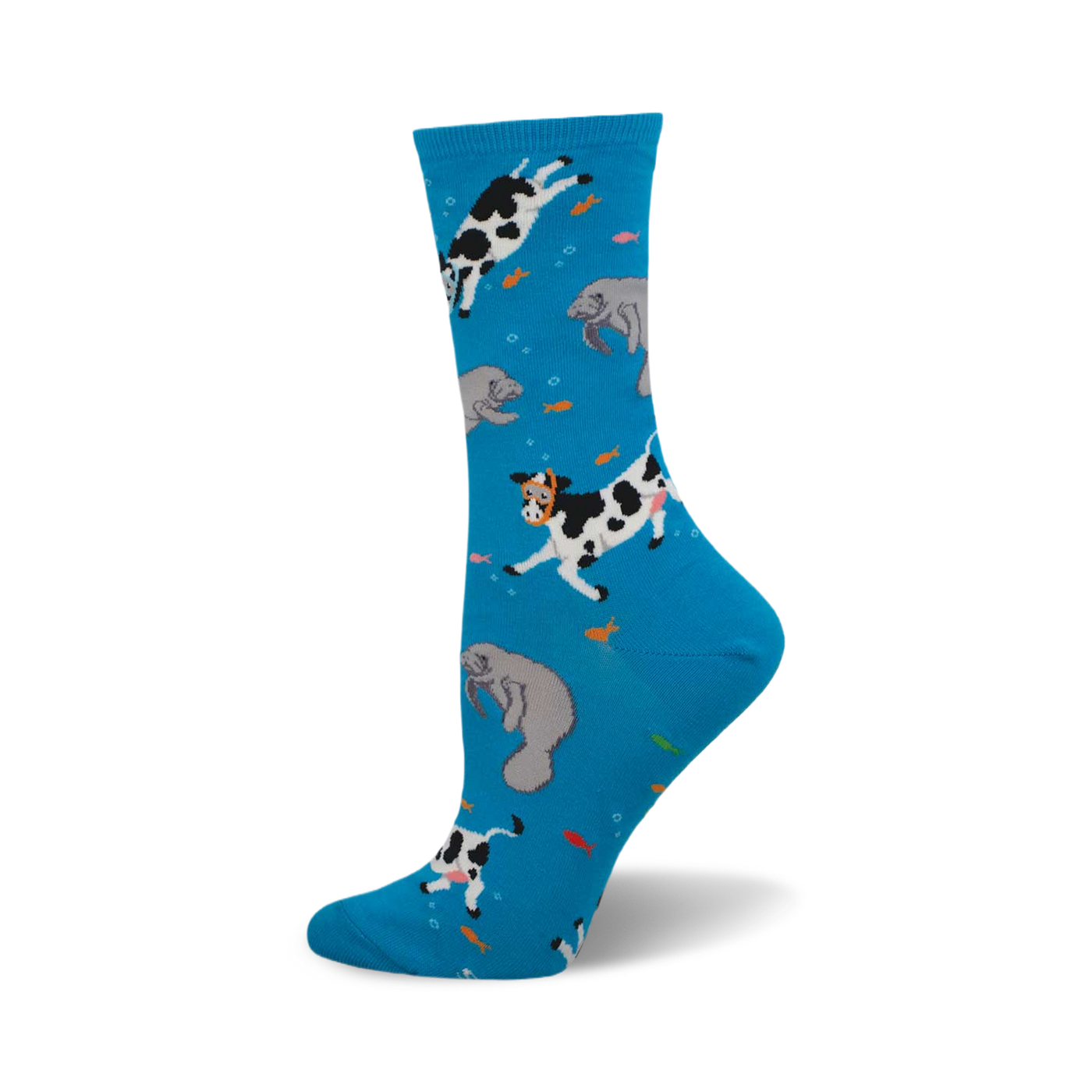 Crew socks in bright blue with a whimsical design of black and white cows and gray manatees swimming amongst orange fish.