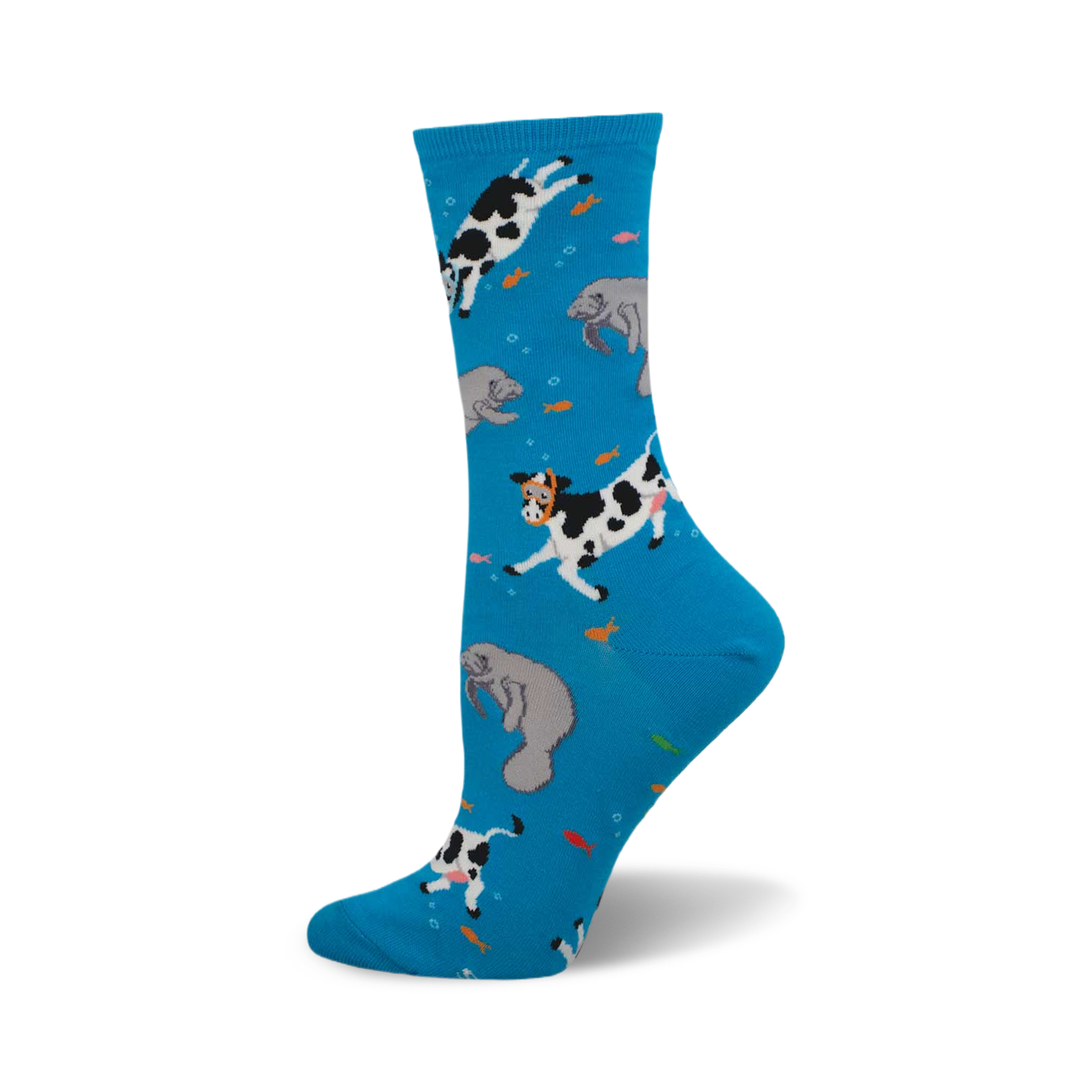 Crew socks in bright blue with a whimsical design of black and white cows and gray manatees swimming amongst orange fish.