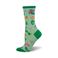 Crew socks in teal green with colorful mermaids, octopus, and coral. Green cuffs add a pop of color. 