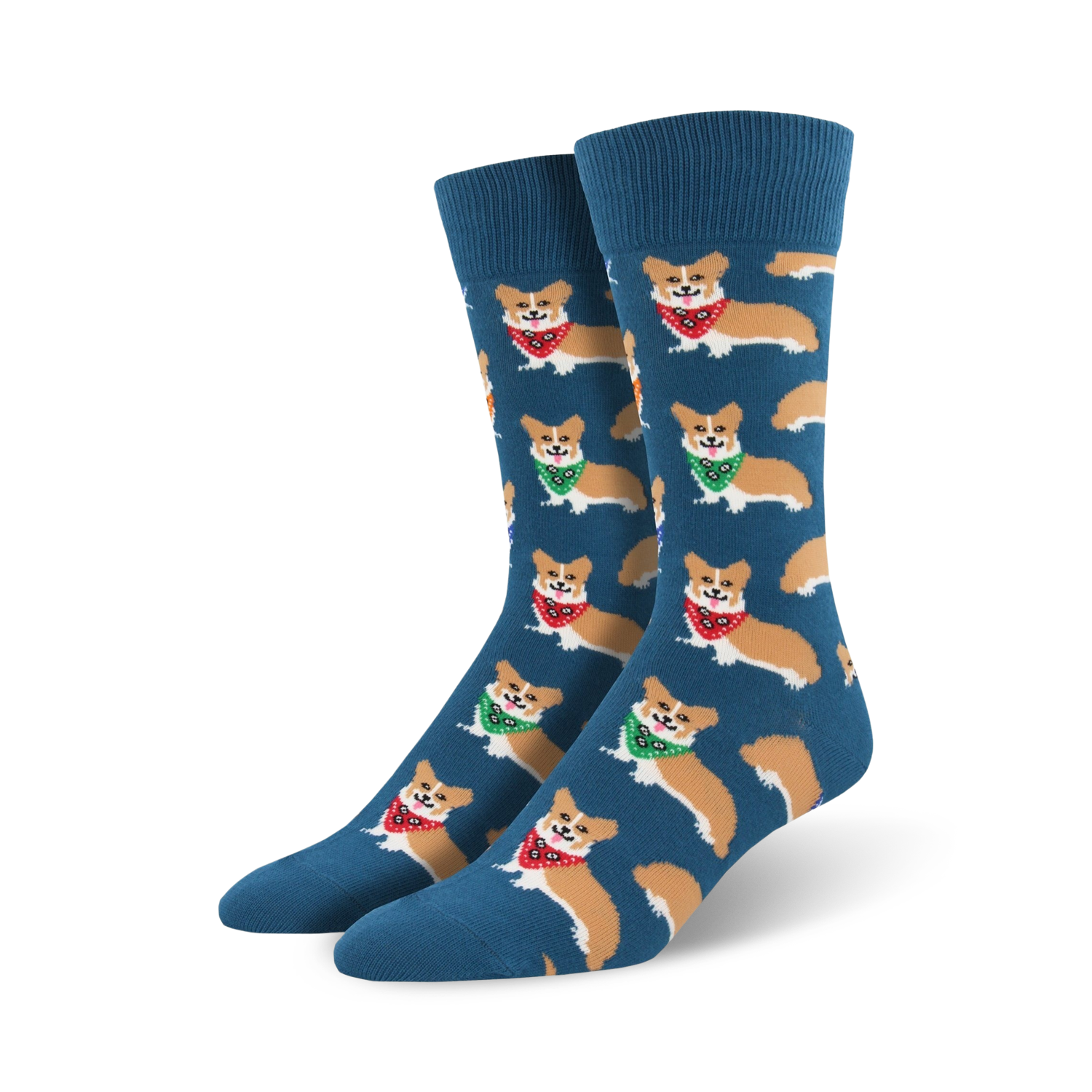 Lifestyle shot showing a model wearing teal crew socks with corgis in bandanas. 
