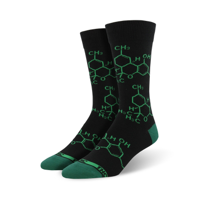 mens black crew socks with green hexagon thc molecule pattern.  