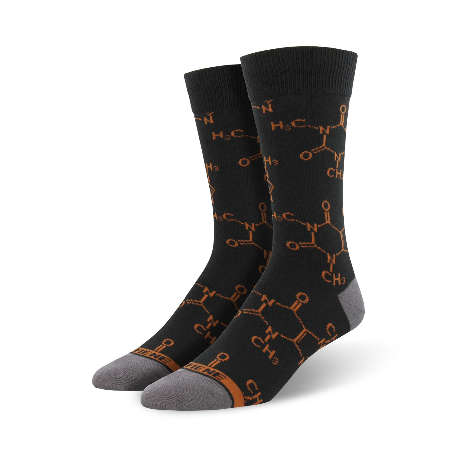 Pair of crew socks in dark grey with a repeating burnt orange caffeine molecule pattern.  The socks have grey heels and toes.