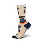 Cream crew socks with navy blue heel and toe.  The socks are adorned with a repeated pattern of colorful book stacks spelling out 'TBR'.