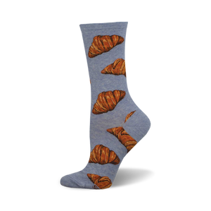 A single light-blue crew sock with a pattern of brown croissants. These fun socks are perfect for the pastry lover in your life.
