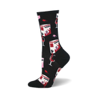 Black crew socks with a fun design of red wine boxes, glasses, and wine spills. Pink and white accents. 
