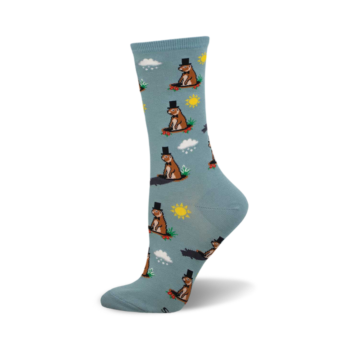 side view of 'six more weeks' socks.  light blue socks feature a repeating pattern of groundhogs in top hats, sunshine, and clouds. }}