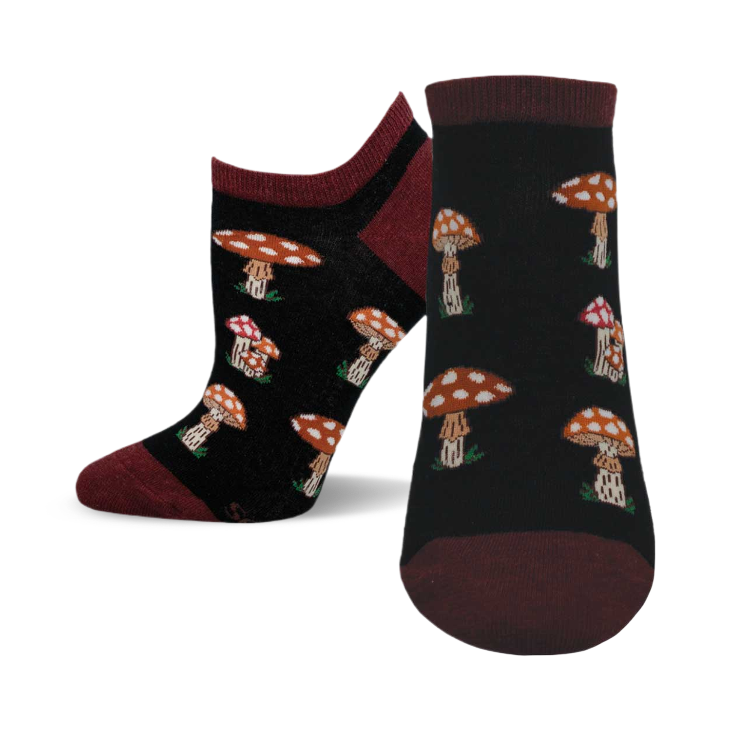 A pair of women's ankle socks in black and burgundy. The socks have a pattern of illustrated mushrooms in shades of orange and red.