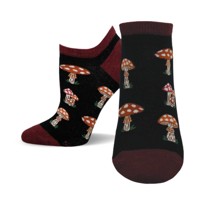 front view of a pair of black ankle socks featuring a repeating pattern of whimsical mushrooms.  "digging the mushrooms" socks.