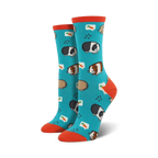 Teal crew socks with guinea pig design shown on a person's feet, next to a succulent plant.