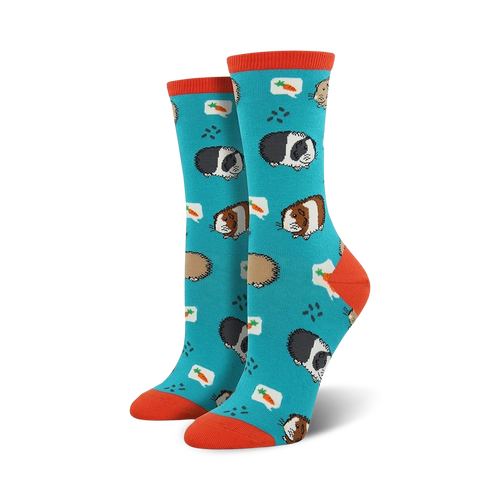 Teal crew socks with guinea pig design shown on a person's feet, next to a succulent plant.