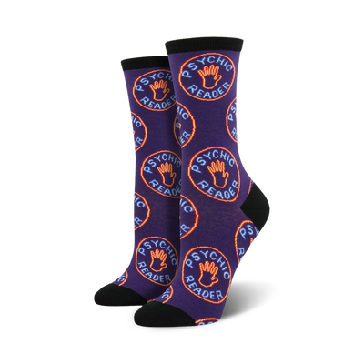 purple crew socks with an all-over pattern of orange and yellow hands with the words "psychic reader"    