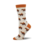Cream crew socks with brown capybaras and small orange circles on them.  Orange cuffs.