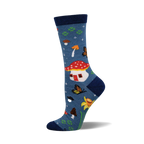 Crew socks in blue featuring mushrooms, butterflies, daffodils, and a mushroom house.  A whimsical nature-inspired design.