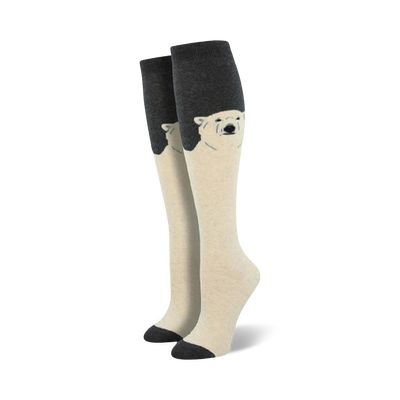 **alt text description:**   white knee-high women's socks feature a pattern of cute polar bears wearing light gray scarves.   