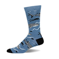 Crew socks in blue featuring a whale shark design with other sharks and divers. Gray, black, and white details on a light blue background.