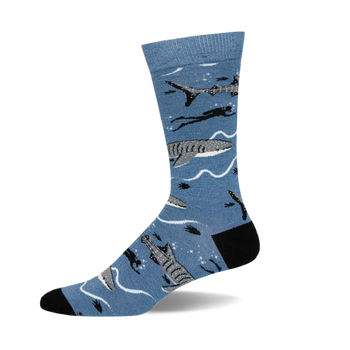 Crew socks in blue featuring a whale shark design with other sharks and divers. Gray, black, and white details on a light blue background.
