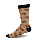 Crew socks showcasing a beige background with repeating illustrations of brown capybaras carrying small oranges.