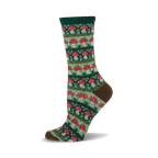 Close-up of a crew sock with a repeating pattern of red and white mushrooms on a green background. Brown cuff detail.