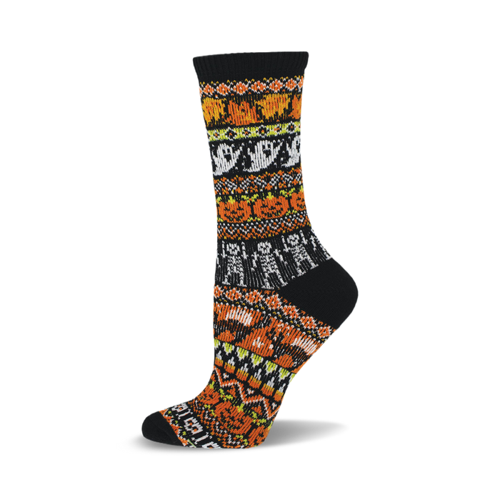 a black sock with orange, yellow, and white patterned stripes featuring pumpkins, ghosts, and skeletons. }}