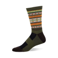 Crew sock, olive green, orange, and cream with dark brown accents. Features Serape pattern of geometric stripes and shapes.